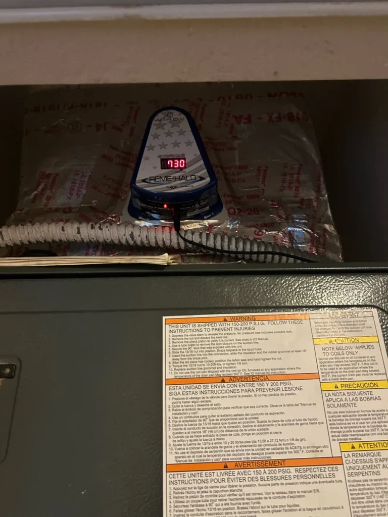 REME HALO air purifier installed in an air handler in Broward County by South Florida Heating and Air Conditioning