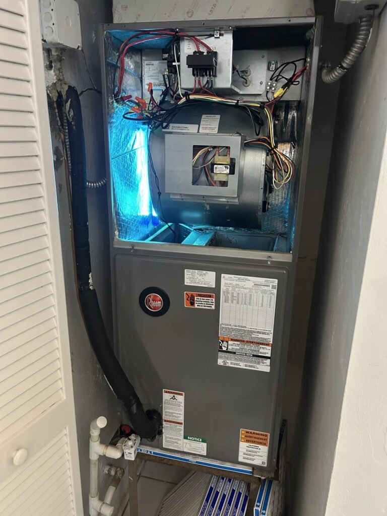 UV germicidal light installed inside an air handler on a residential HVAC system in Broward County